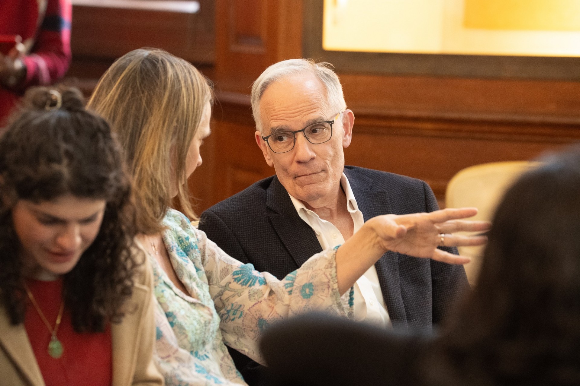 SynThesis Judge Line Lillevik, Program Director for the MA/MSc in International and World History and Adjunct Assistant Professor of History speaks with Dean Carlos Alonso. Audience members speaking.