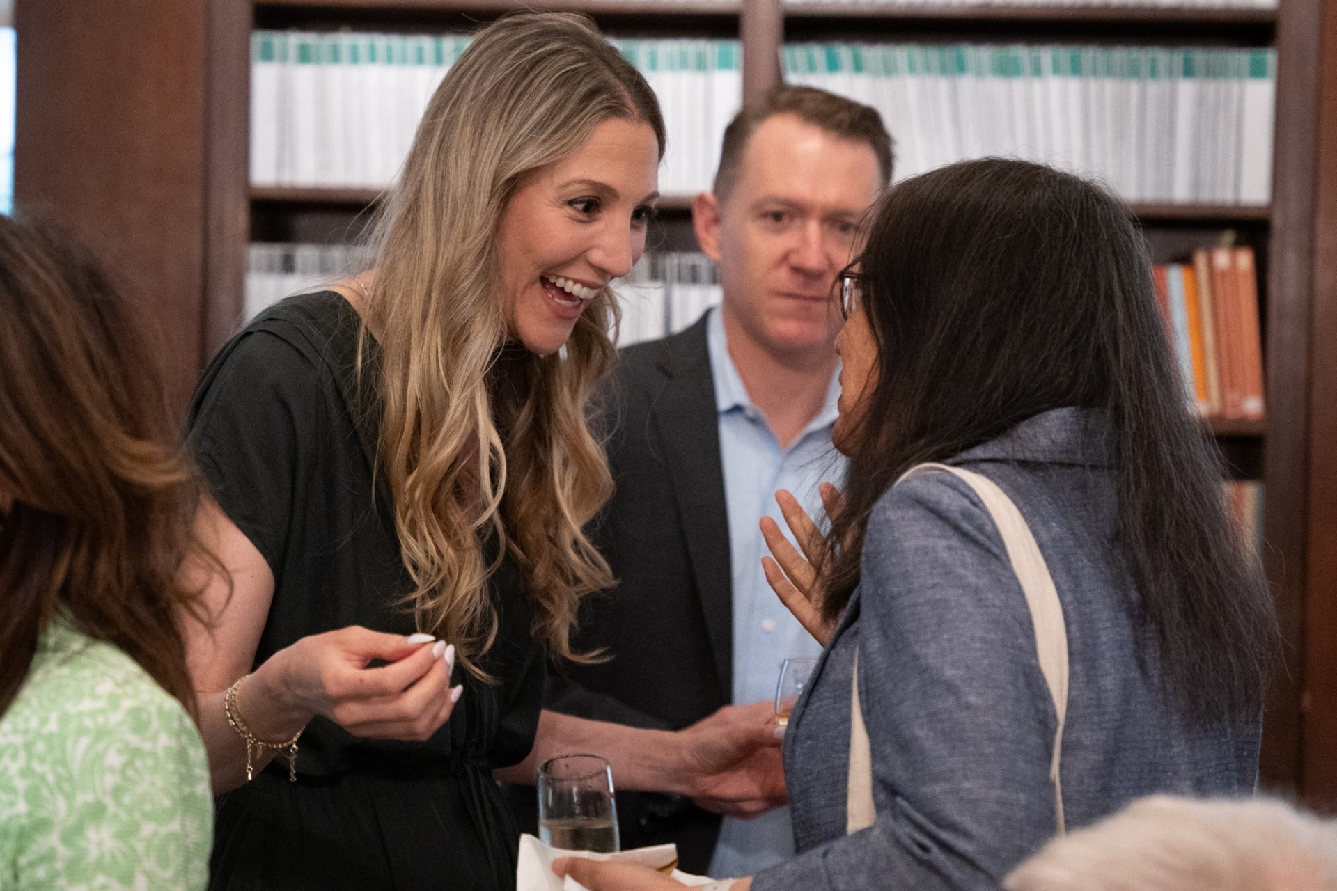 Lauren Faber O’Connor (’05MA, Climate and Society) chatting before receiving The Dean’s Award for Distinguished Achievement People talking