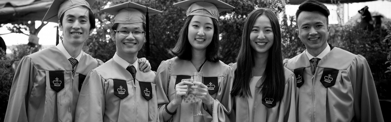 graduates standing together