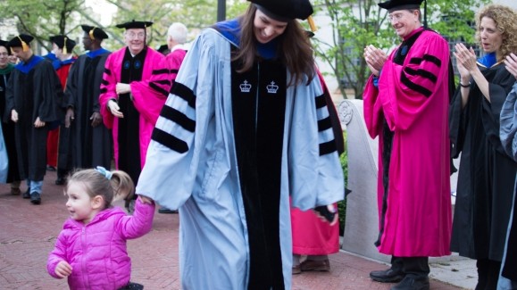 Graduate with child