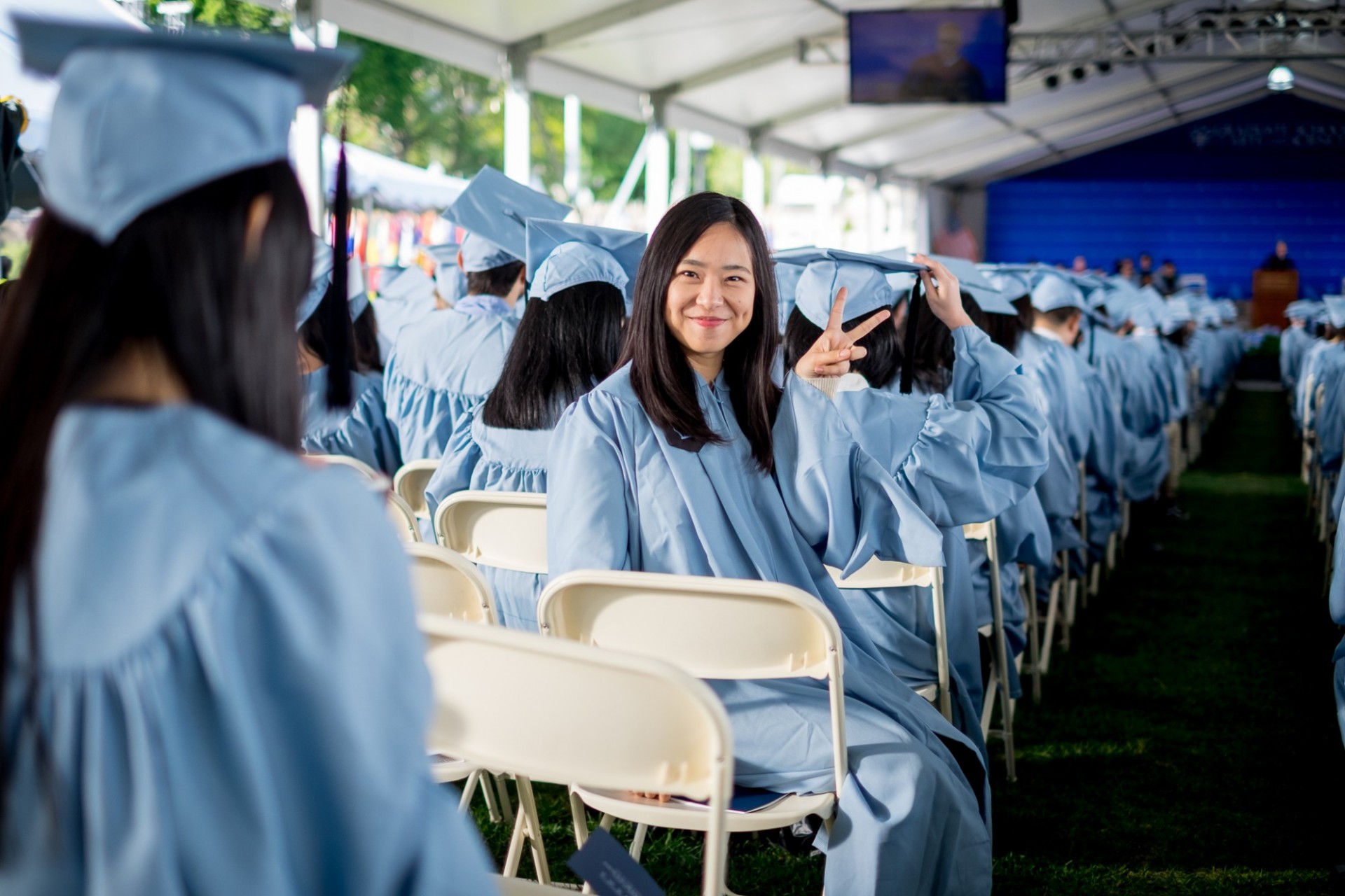 Master’s graduates take their seats. Master’s graduates take their seats.