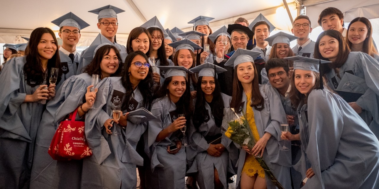 Economics students pose for photos after the ceremony.