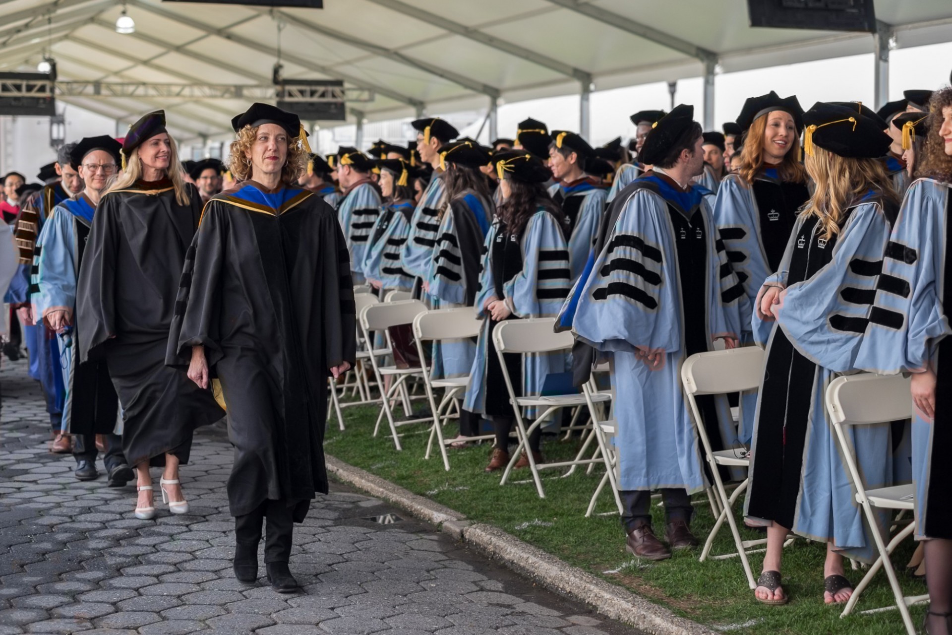 Andrea Solomon, vice dean of GSAS, leads the faculty procession at the start of the doctoral ceremony.