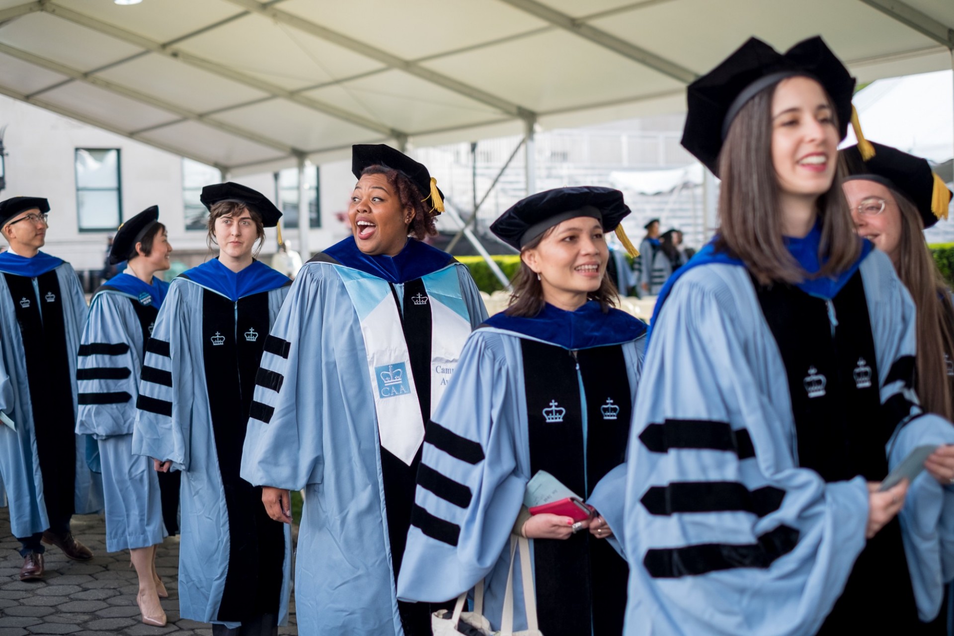 Angelica Patterson, PhD candidate in Earth and Environmental Sciences, spots one of her fans in the crowd.