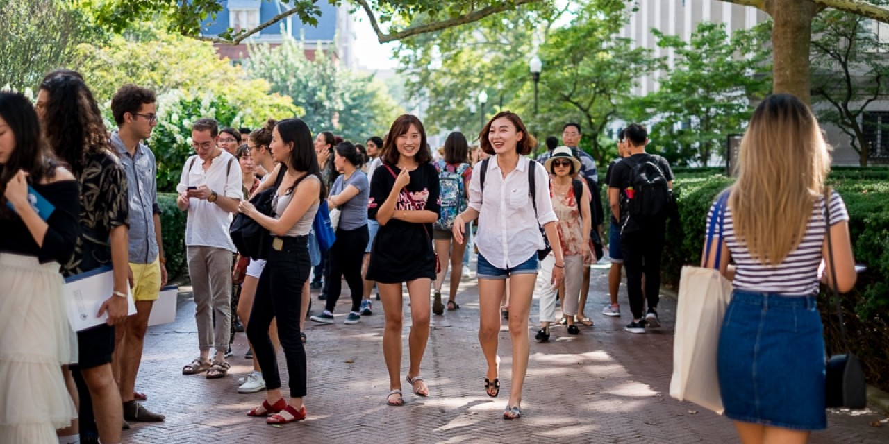 people walking on campus