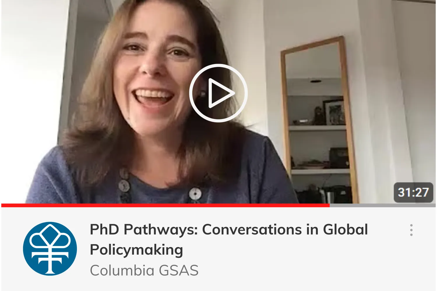 Smiling woman with shoulder-length hair in a video thumbnail for "PhD Pathways: Conversations in Global Policymaking" by Columbia GSAS, duration 31:27.